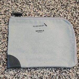 Gray Wallet with Zipper and Textured Fabric